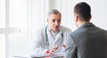 man at an appointment with a specialist